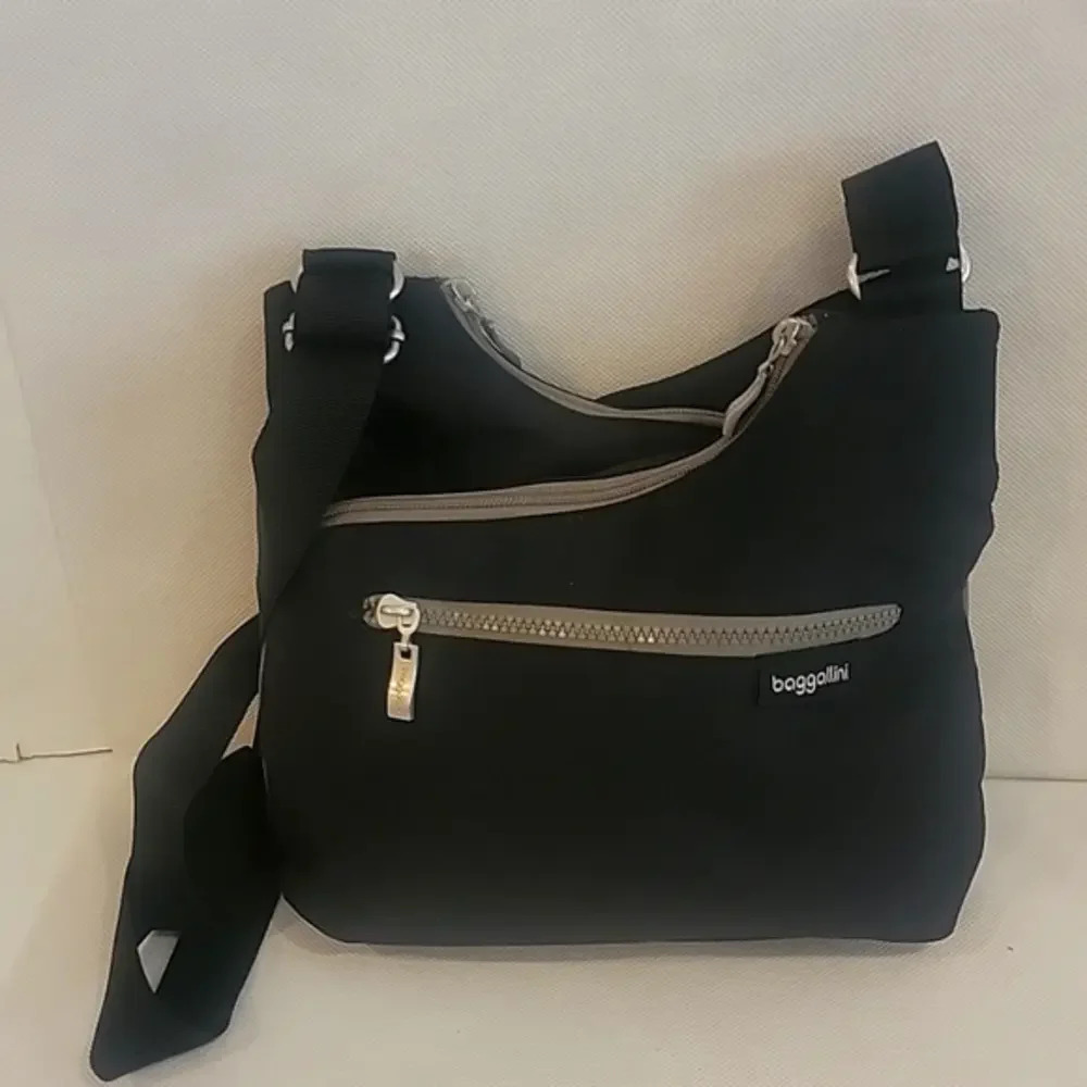 NEW - BAGGALLI CRISS CROSS HANDBAG WITH CROSSBODY STRAP